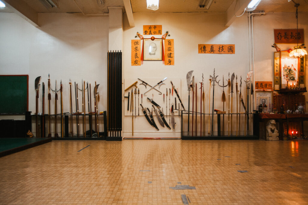 Wudokan's Martial Arts Sanctuary: Weapon Racks with School Crest